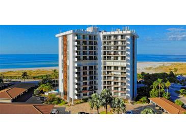 Aerial view of a beachfront high-rise building with ocean and beach views at 1 Benjamin Franklin Dr # 121, Sarasota, FL 34236