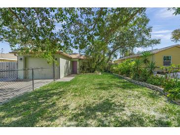 Charming single story home with a spacious lawn and mature trees at 214 Patterson Ave, Osprey, FL 34229