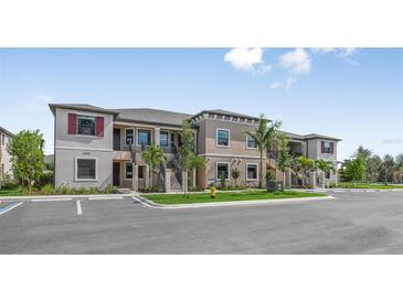 Two-story building with multiple units and parking at 23887 Collina Way # 5203, Port Charlotte, FL 33980