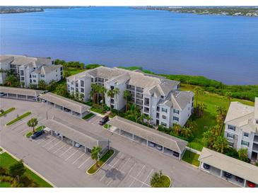 Luxury condo building with water views and covered parking at 1010 Tidewater Shores Loop # 201, Bradenton, FL 34208
