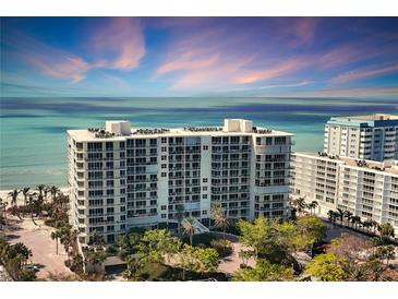 Stunning beachfront condos boast private balconies overlooking the ocean and lush landscaping at 1800 Benjamin Franklin Dr # A304, Sarasota, FL 34236
