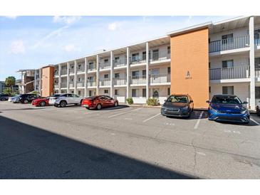 Building exterior with ample parking at 5902 Garden Ln # A24, Bradenton, FL 34207
