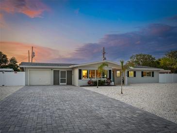 Updated home exterior boasts a paved driveway and modern facade at 5218 6Th Avenue W Dr, Bradenton, FL 34209