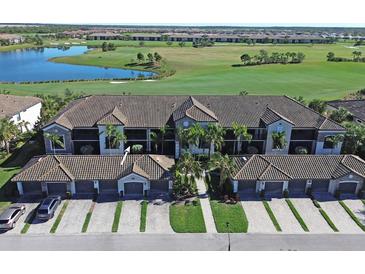 Luxury condo community boasting golf course and lake views at 5548 Palmer Cir # 102, Bradenton, FL 34211