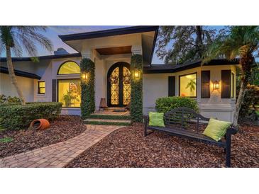 Elegant home with inviting entryway and landscaped grounds at 1598 Oak N Cir, Sarasota, FL 34232