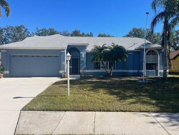 Attractive single-story home with a two-car garage and well-maintained lawn at 4612 35Th E Ave, Palmetto, FL 34221