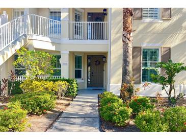 Inviting front exterior with a well-maintained landscape and a welcoming entryway at 5613 Key Largo Ct, Bradenton, FL 34203