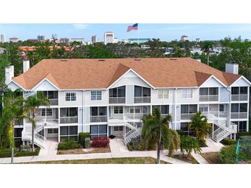 Well-maintained condo building featuring multiple units and charming staircases at 850 S Tamiami Trl # 227, Sarasota, FL 34236