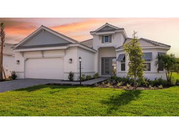 Inviting front exterior of a two-story home with a paved driveway and landscaped yard at 15508 San Lazzaro Avenue, Bradenton, FL 34211