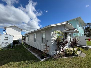 Charming single-story home with landscaped yard and shed at 1393 Good Ave, Sarasota, FL 34239