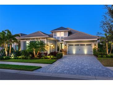 Stunning two-story home with a charming facade and landscaped yard at 15407 Castle Park Ter, Lakewood Ranch, FL 34202