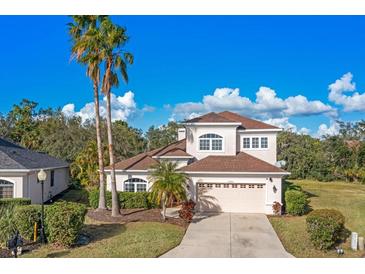 Beautiful two-story home with a two-car garage and lush landscaping at 12342 Lavender Loop, Bradenton, FL 34212