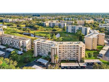 Aerial view of condo community with golf course and pool at 3640 Ironwood Cir # 601N, Bradenton, FL 34209