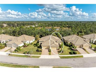 Luxury villa community; single-Gathering home with two-car garage at 1230 Collier Pl, Venice, FL 34293