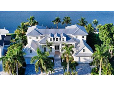 Luxury waterfront home with metal roof and pool at 178 N Washington Dr, Sarasota, FL 34236