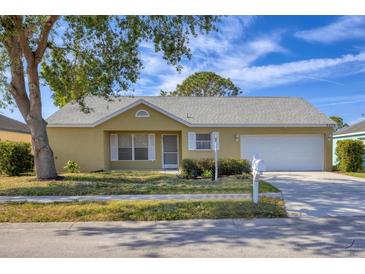 House exterior showcasing a one-story home with a front yard at 3229 6Th W Ave, Palmetto, FL 34221