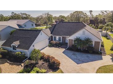 Attractive single-story home with a two-car garage and nicely landscaped yard at 3808 El Conquistador Pkwy, Bradenton, FL 34210
