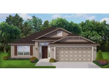 Charming single-story home featuring a wide two-car garage, well-manicured lawn and neutral color palette at 2687 Averland Loop, North Port, FL 34287