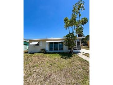 Charming single-story home with a well-maintained lawn and inviting curb appeal at 4444 Los Rios St, North Port, FL 34287