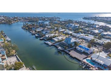 Waterfront community with canals and docks, perfect for boating enthusiasts and waterfront living at 526 67Th St, Holmes Beach, FL 34217