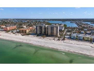 Stunning aerial view of beachfront condos and ocean, offering luxurious coastal living with amazing waterfront access at 900 Gulf Blvd # 805, Indian Rocks Beach, FL 33785
