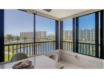 Enclosed lanai featuring views of the inter coastal waterway at 5780 Midnight Pass Rd # 303B, Sarasota, FL 34242