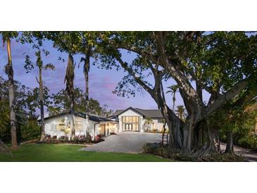Stunning two-story home with grand entrance and mature trees at 4620 Riverview Blvd, Bradenton, FL 34209