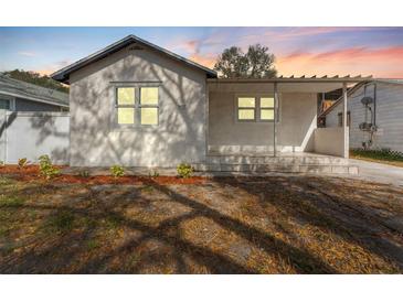 Charming single-story home featuring a covered front porch and freshly painted exterior at 3457 50Th N Ave, St Petersburg, FL 33714