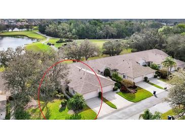 Well-maintained single-Gathering home with lush landscaping, attached garage, and neutral color palette at 6314 Stone River Rd # 6314, Bradenton, FL 34203