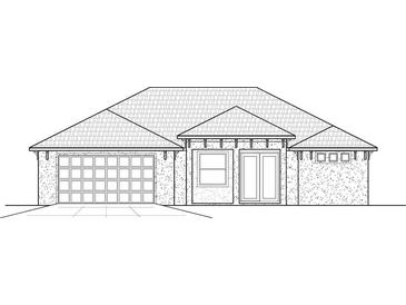 Charming single-story house with a two-car garage and well-designed roofline at 776 Cypress Rd, Venice, FL 34285