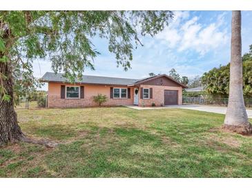 Charming single-Gathering home with a brick facade and well-manicured lawn at 1622 17Th E St, Bradenton, FL 34208