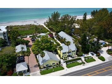 An aerial view shows the Wicker Inn Resort near the pristine beachfront at 5581 Gulf Of Mexico Dr, Longboat Key, FL 34228