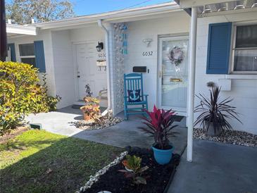 Charming condo with a cozy, decorated front entrance and curb appeal at 6032 Arlene Way, Bradenton, FL 34207