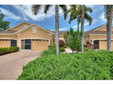 Charming single-Gathering home with well-maintained landscaping and a brick driveway at 4790 Turnberry Cir, North Port, FL 34288