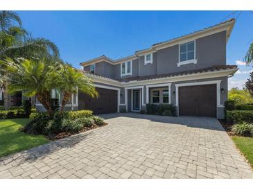 Stunning two-story home with a three-car garage and beautiful landscaping at 12022 Medley Ter, Lakewood Ranch, FL 34211