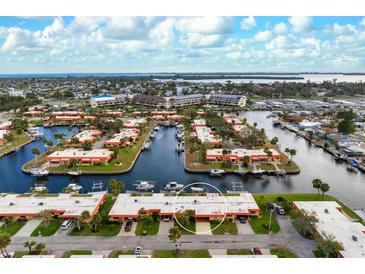 Waterfront community with canal access and boat docks, offering a serene and picturesque setting at 9527 Azure Cv, Bradenton, FL 34210