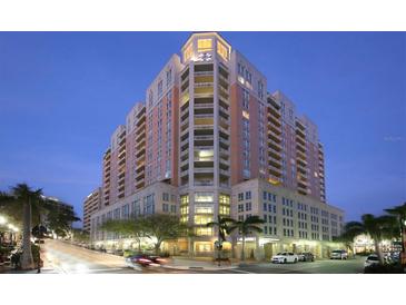 Stunning high-rise condominium featuring multiple stories, a clock tower, and private balconies at 1350 Main St # 1701, Sarasota, FL 34236