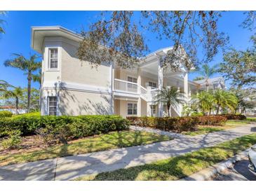 Beautiful two-story condo with landscaped yard and covered stairway entrance, perfect for Florida living at 3701 54Th W Dr # 103, Bradenton, FL 34210
