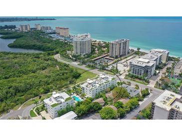 Coastal building near the ocean, offering beach access and luxurious amenities at 129 Taft Dr # W102, Sarasota, FL 34236