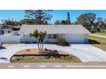 Charming single-story home with well-maintained landscaping and a spacious driveway at 4120 Shamrock Dr, Venice, FL 34293