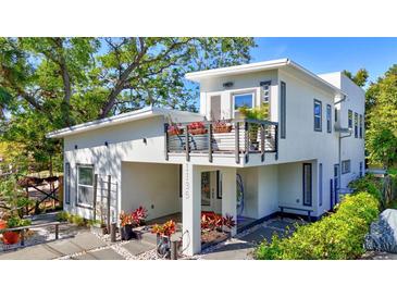 Stylish two-story modern home with a balcony and well-maintained landscaping at 1135 Florida Ave, Sarasota, FL 34236
