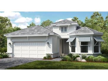 Charming single-story home showcasing a clean white exterior, gray roof, and a two-car garage at 14953 Contenta Loop, Bradenton, FL 34211