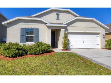 Charming single-Gathering home with manicured lawn and attached two-car garage at 177 Tierra Verde Way, Bradenton, FL 34212