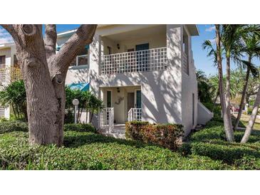 Charming two-story condo with landscaped front yard and balcony at 318 108Th St W # 318, Bradenton, FL 34209