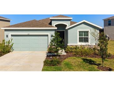 Charming single-Gathering home with a two-car garage and well-maintained landscaping at 3677 Turning Tides Ter, Bradenton, FL 34208