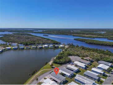 Beautiful aerial view of property with water views, serene setting at 759 Lakeside Dr, North Port, FL 34287