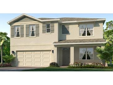 Charming two-story home featuring a two-car garage, neutral tones, and lush landscaping at 17218 Wheatberry Blvd, Parrish, FL 34219