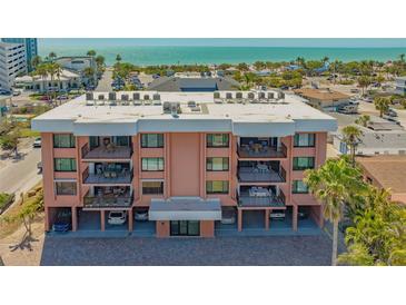 Charming condominium featuring multiple balconies with ocean views and covered parking at 131 Garfield Dr # 4D, Sarasota, FL 34236