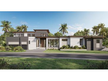 Stunning modern home with mixed material exterior, mature landscaping, and inviting front entrance at 2100 Mcclellan Pkwy, Sarasota, FL 34239