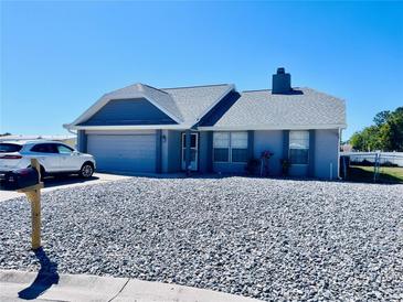 Charming single-story home with well-maintained landscaping and neutral exterior paint at 3608 67Th Street Ct W, Bradenton, FL 34209